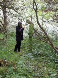 mum and figure in woods