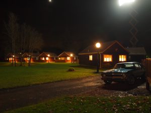 Outlander film set, rustic cabin, scissor lift and light
