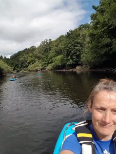 paddling on the river earn