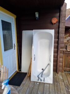 old bath in bathroom conversion