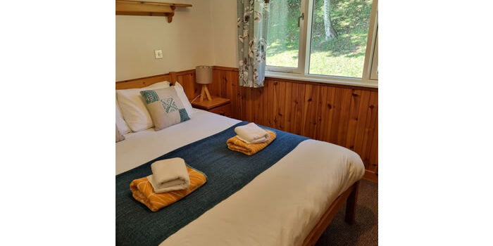 Elcho Lodge bedroom 2 double bedroom in Elcho Lodge looking out at the trees