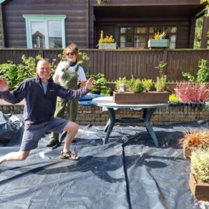 lady gardener preparing planters