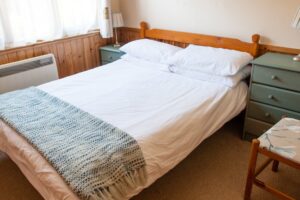 double room showing double bed at river edge lodges