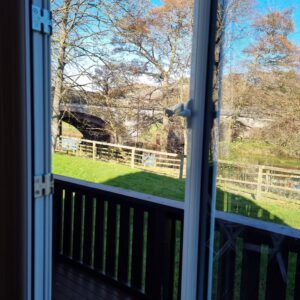new patio doors in Moncreiffe lodge 15, showing the lovely view of the river and bridge